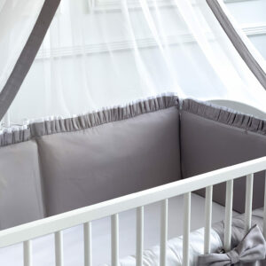 A simple Bed Bumper without added details added to a baby's bed for better protection during sleeping time